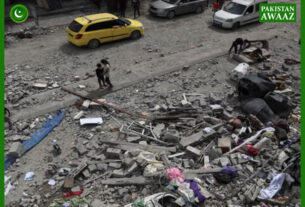 Israeli fire kills 60 in Gaza, many near aid site, medics say